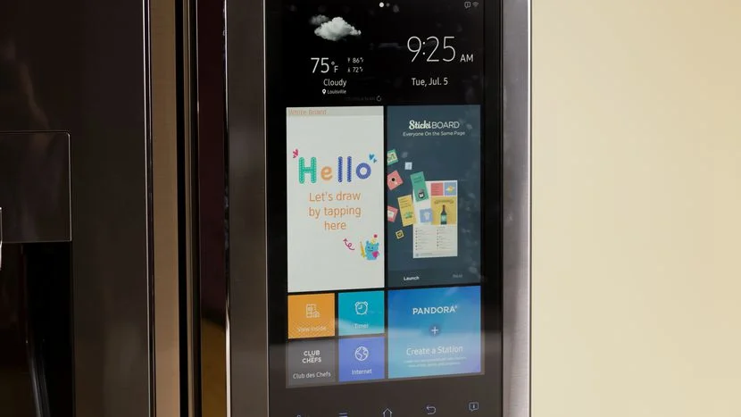 Samsung Smart Fridges — Close-up of Samsung Family Hub smart fridge touchscreen showing weather widget and apps
