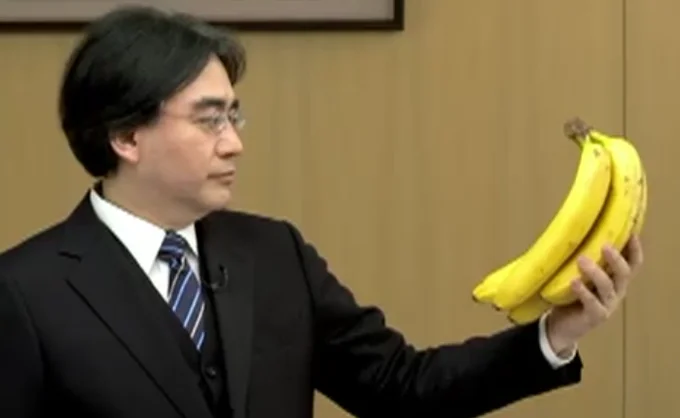Satoru Iwata — Collage of Iwata 'Please Understand' meme images including bananas and Pokémon Bank apologies.