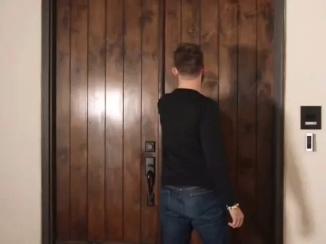 Scott Cawthon's MatPat Final Theory Cameo — Scott Cawthon in a green velvet blazer leaning on a doorframe looking at the camera