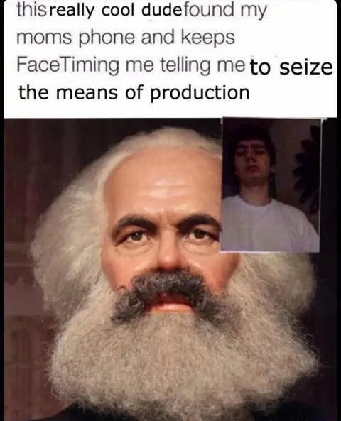 Karl Marx wax figure with tweet about FaceTiming to seize the means of production