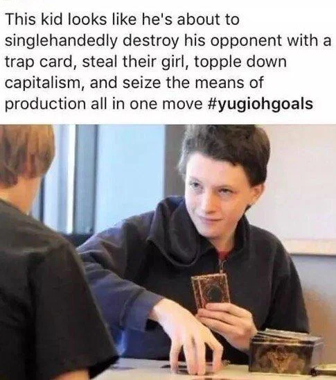 Seize the Means of Production — Confident Yu-Gi-Oh player with caption about seizing the means of production in one move