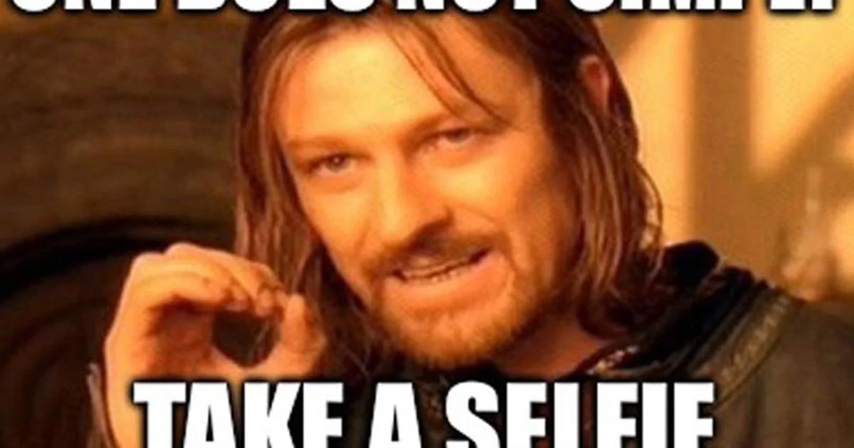 A cropped meme showing Aragorn with white text 'ONE DOES NOT SIMPLY TAKE A SELFIE'.