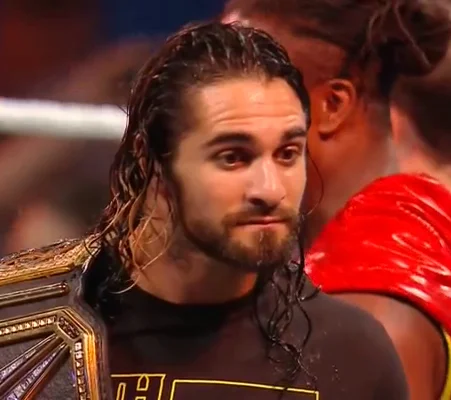 Animated GIF of Seth Rollins and Roman Reigns on WWE Live