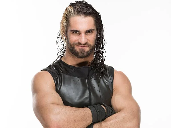 Seth Rollins WWE promotional portrait with arms crossed