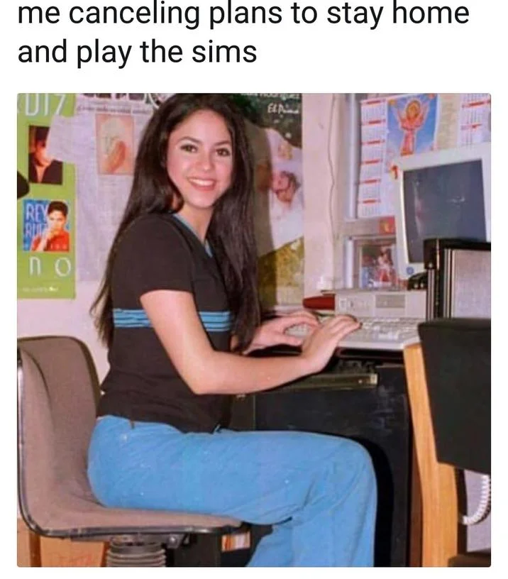 Shakira On The Computer — Shakira at computer meme captioned about canceling plans to play The Sims