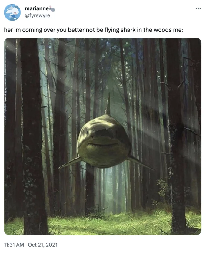Tweet from marianne joking about being a flying shark in the woods, with the shark painting attached