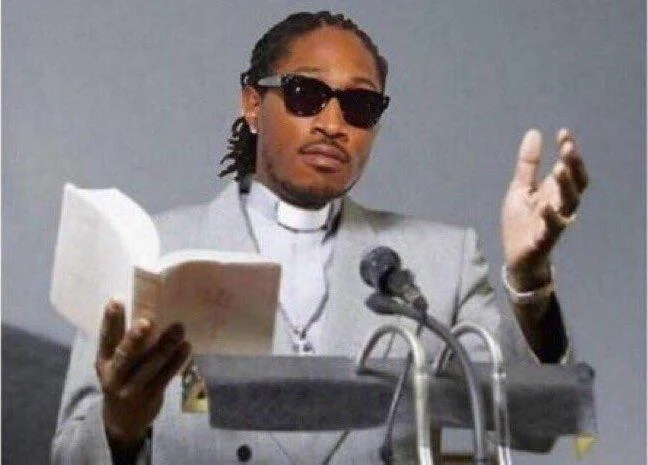 She Belongs To The Streets — Rapper Future dressed as a preacher at a pulpit, reading from a book while wearing sunglasses and a clerical collar.