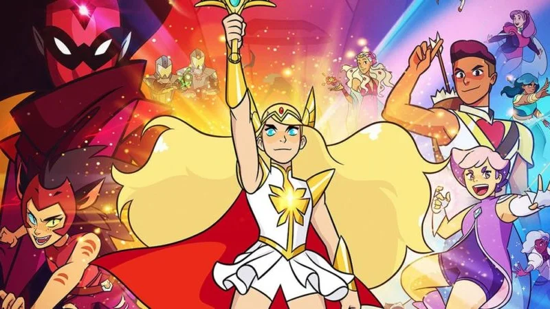She-Ra and the Princesses of Power promotional poster featuring She-Ra raising her sword surrounded by ensemble cast