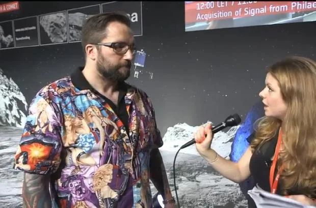 Shirtstorm — Matt Taylor wearing a shirt printed with cartoon pin-up women during an ESA Rosetta mission interview