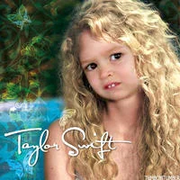 Side Eyeing Chloe — A portrait-style photograph of a blonde girl with a neutral expression against a neutral background.