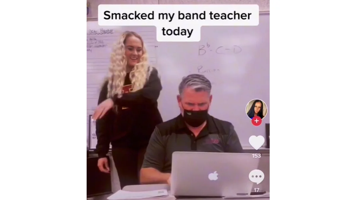 Slap A Teacher Challenge — TikTok screenshot of a student behind her band teacher with caption 'Smacked my band teacher today'