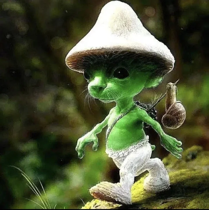 Green-colored Smurf Cat with white hat in forest setting