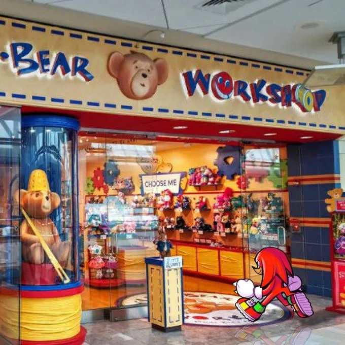 Sonic Characters Walking Into Stores — Knuckles the Echidna at Build-A-Bear Workshop colorful store entrance.