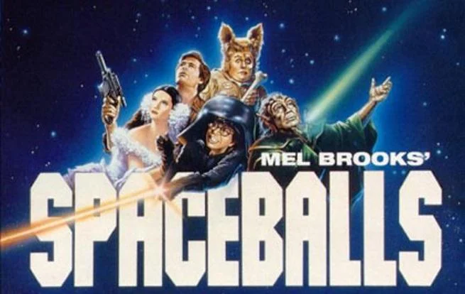 Spaceballs movie title artwork with characters posed above the film's logo.