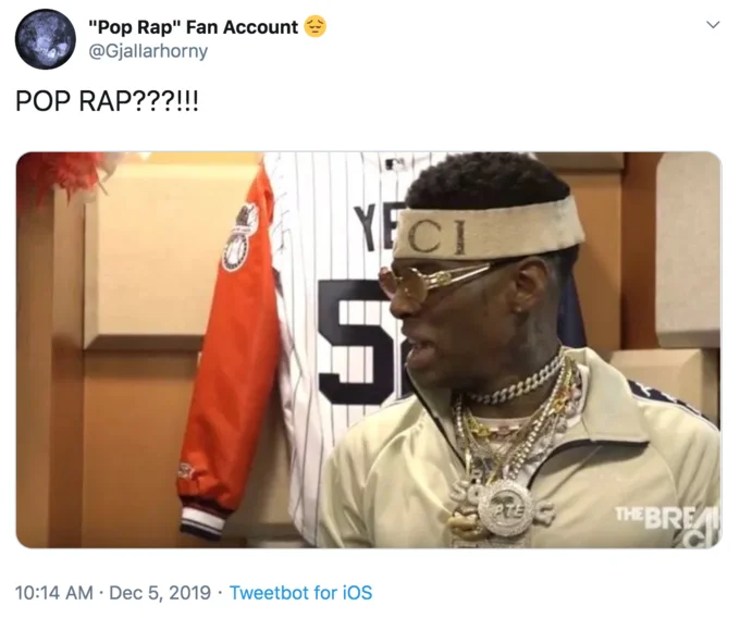 Spotify Wrapped Memes — Twitter post from @Giallhorny with 'POP RAP???!!!' reaction and surprised person screenshot about genre classification.