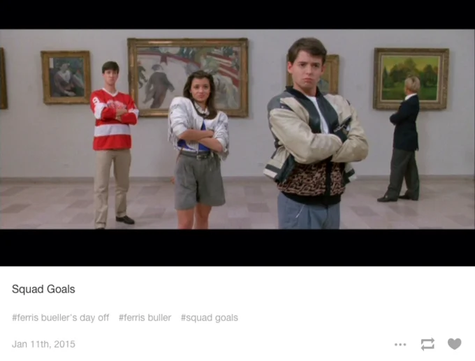 Four young people standing together in an art museum wearing casual to smart-casual attire, captioned 'Squad Goals.'