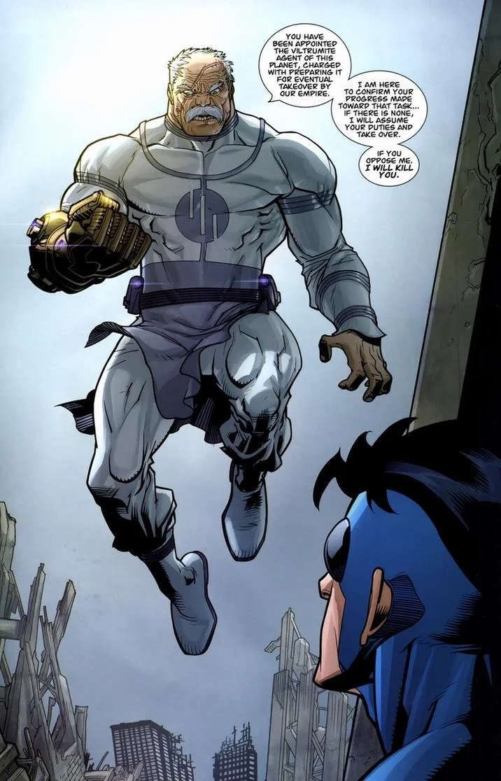 Stand Ready For My Arrival Worm — Full-color Invincible comic panel showing scarred villain in white suit hovering over diminutive character amid destroyed