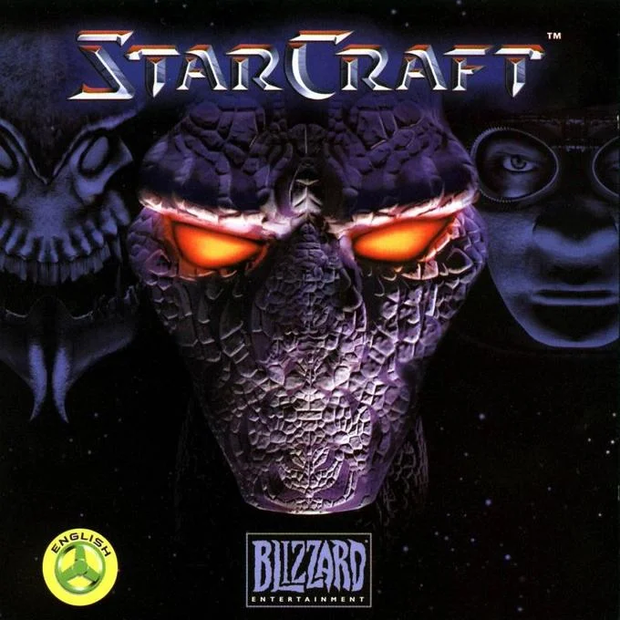 StarCraft 1998 game box cover with Zerg, Protoss, and Terran characters