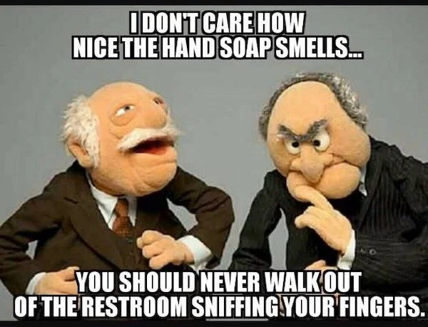 Statler and Waldorf meme with humorous text about hand soap and restroom fingers