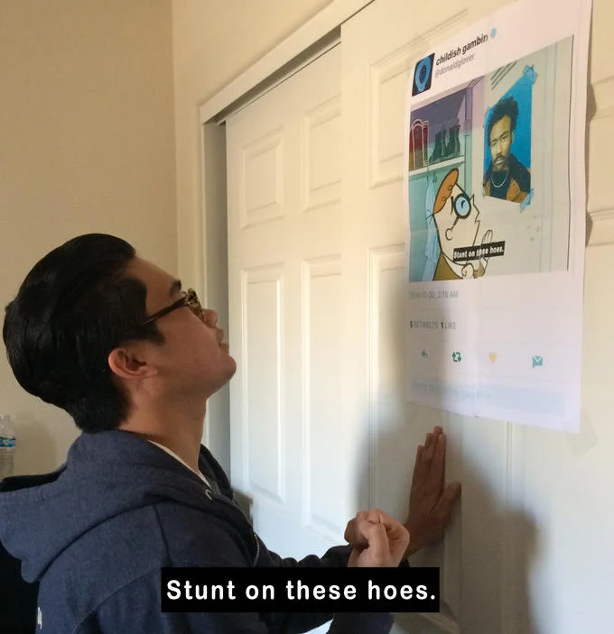 Person taping printed Stunt on these hoes tweet to a door as a real-life meme recreation