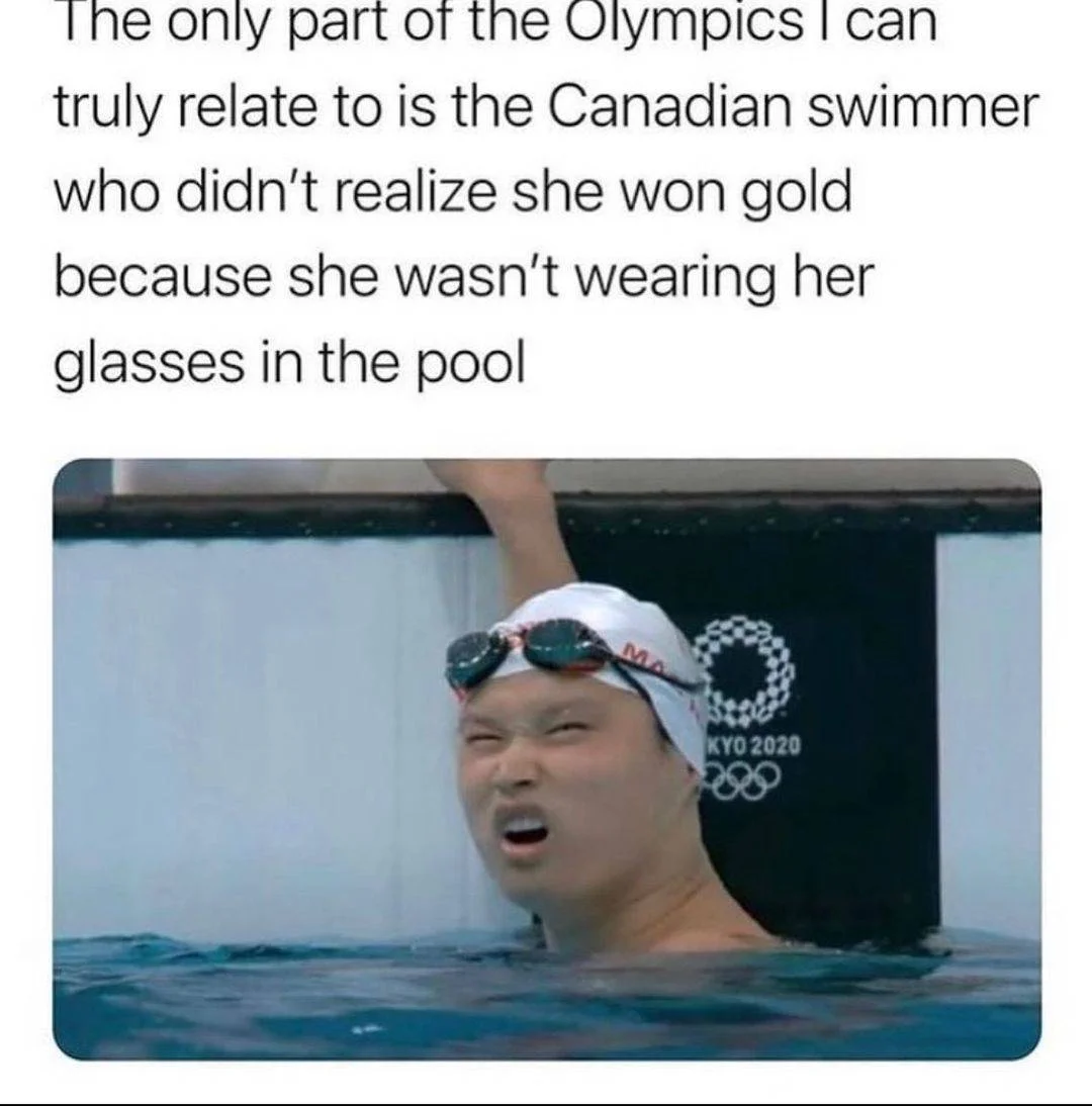 Summer Glasses — Olympic swimmer wearing dark sunglasses with white X markings on lenses during competition.