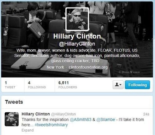 Texts From Hillary — Hillary Clinton laughing with two staffers looking at their phones