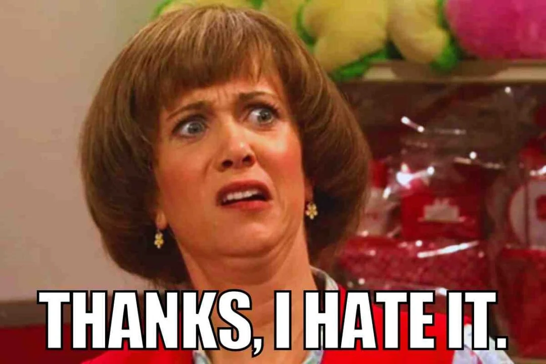 Thanks I Hate It — Woman with disapproving expression and white impact text 'THANKS, I HATE IT.'