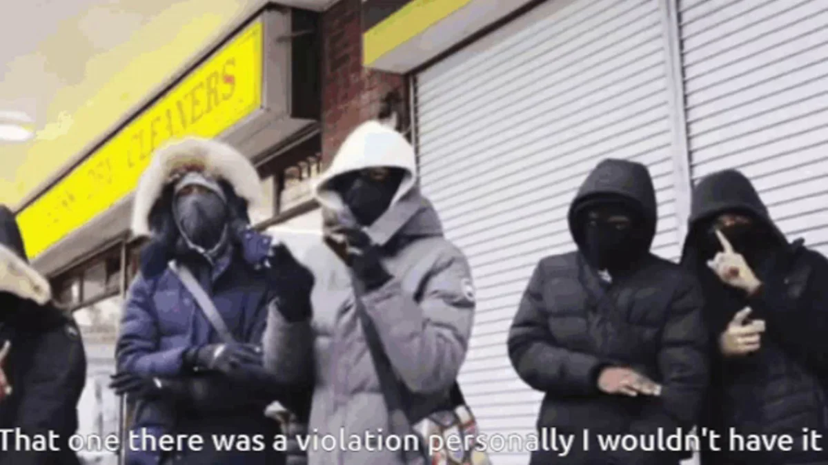 That One There Was A Violation, Personally I Wouldn't Have It — Group of masked people in hooded puffer jackets outside a cleaners shop with caption 'That one