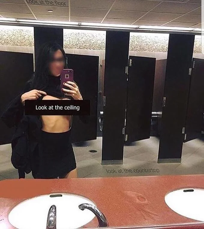 The Circle Game — Bathroom mirror selfie with multiple look at text labels