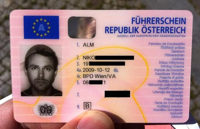 The Flying Spaghetti Monster — Austrian driver's license photo of a man wearing a colander as Pastafarian religious headwear.