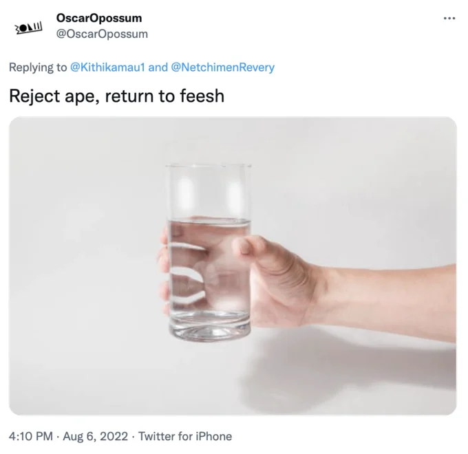 The I Am Not A Fish Hiccups Cure — Tweet by OscarOpossum saying 'Reject ape, return to feesh' with a photo of a hand holding a glass of water.