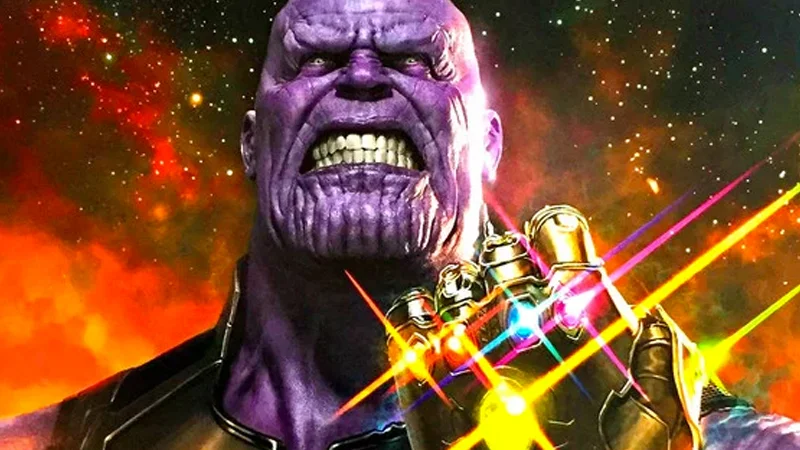 The Infinity Gauntlet — Thanos wearing the glowing Infinity Gauntlet with colored beams emanating from the stones