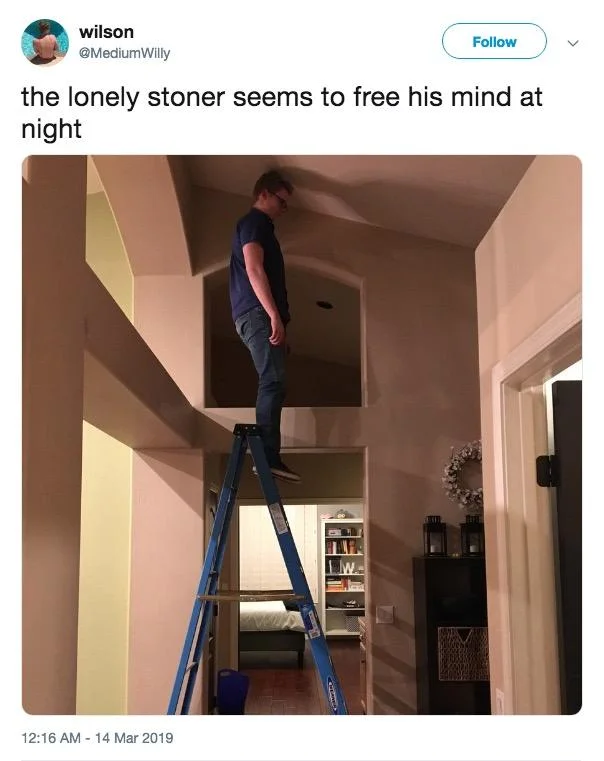 The Lonely Stoner Seems to Free His Mind at Night — Tweet with the lyric caption and photo of a man standing atop a tall ladder indoors.