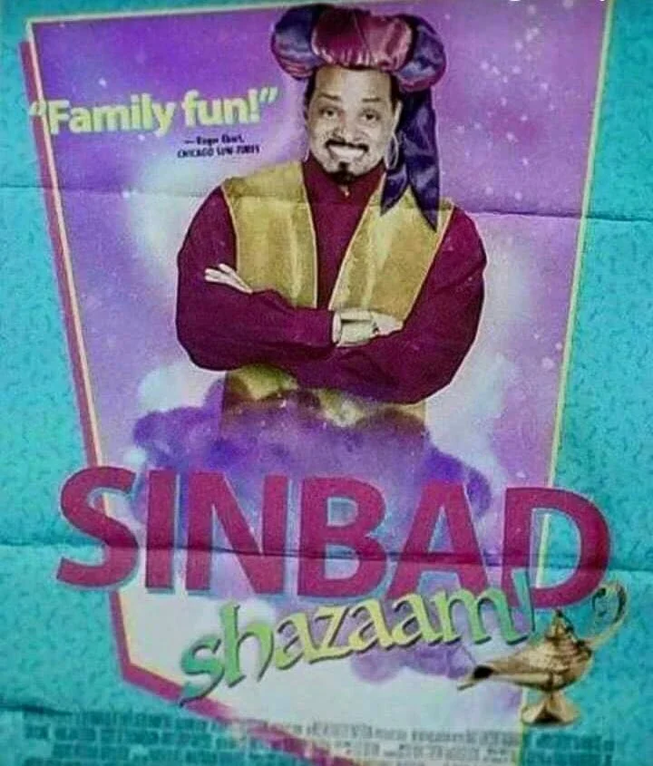 The Mandela Effect — A mock movie poster for 'Sinbad: Shazaam' depicting the comedian in a purple genie costume with a magic lamp graphic.