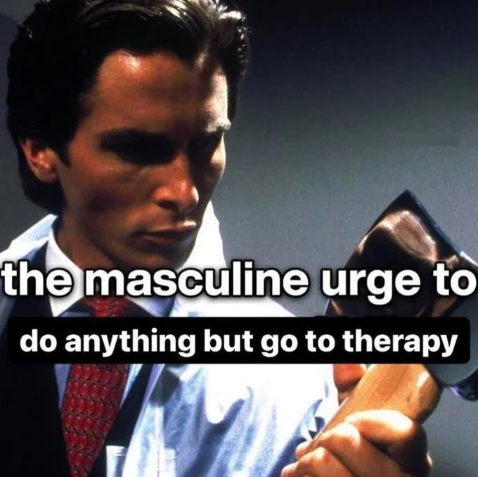 The Masculine Urge — Image macro of a man against a light blue background captioned about avoiding therapy, a viral masculine urge variation.