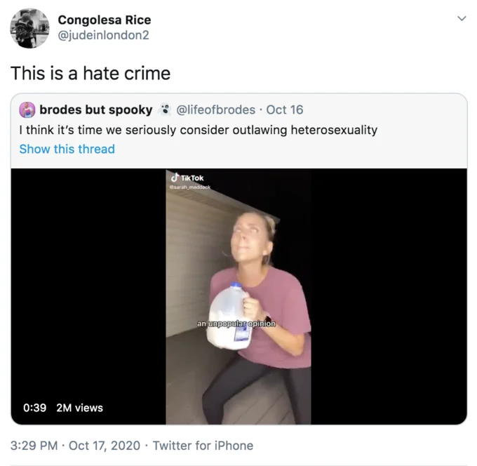 The Milk Is Its Dad And The Box Is The Mom — Tweet reading 'This is a hate crime' quoting the milk TikTok and a related reply
