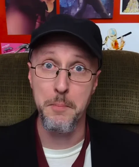 Close-up of the Nostalgia Critic with a deadpan stare