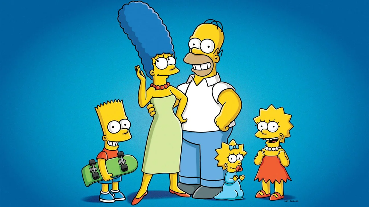The Simpsons — The Simpson family—Bart, Marge, Homer, Maggie, and Lisa—posed together on a blue background