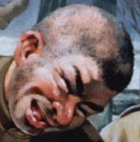The Soviet Liberator Le Liberator Face — Close-up portrait of a man with exaggerated caricatured facial features characteristic of the Soviet Liberator meme.