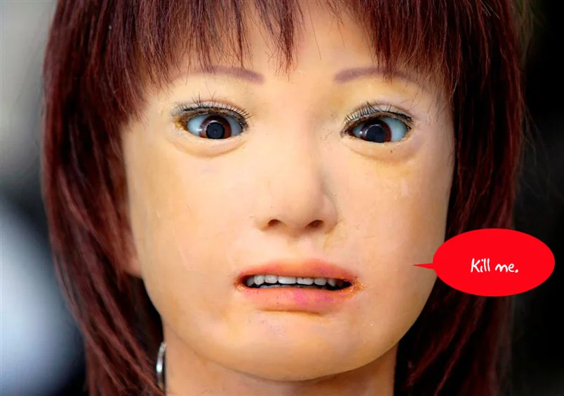 The Uncanny Valley — Close-up of lifelike humanoid robot Saya with speech bubble saying 'Kill me'