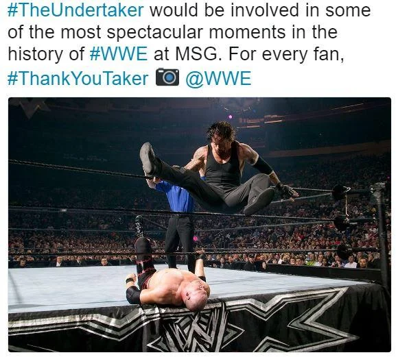 Social media post of a wrestler kneeling before The Undertaker in the ring, labeled Legend hashtag ThankYouTaker
