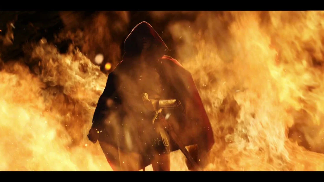 TheLegend27 — Hooded warrior with a sword standing in flames from Game of War commercial