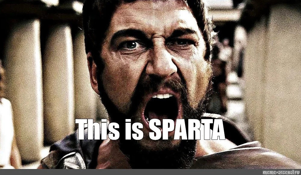Focused headshot of King Leonidas screaming with white text 'This is SPARTA' overlaid.