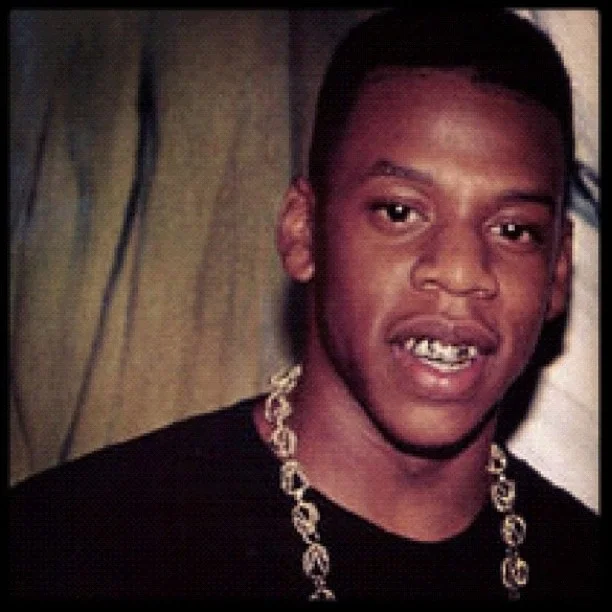 Throwback Thursday — Vintage photo of young Jay-Z with gold chain and grill