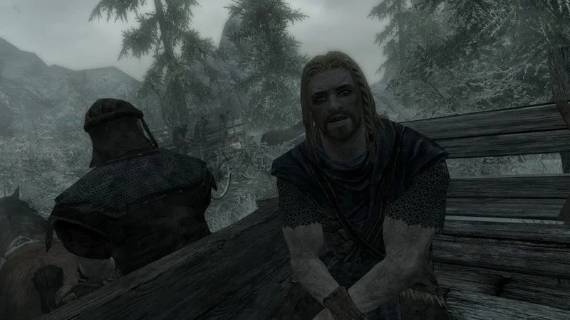Toddroll/You're Finally Awake — Clear screenshot of Skyrim opening with Ralof and companion in cart through snowy pines.