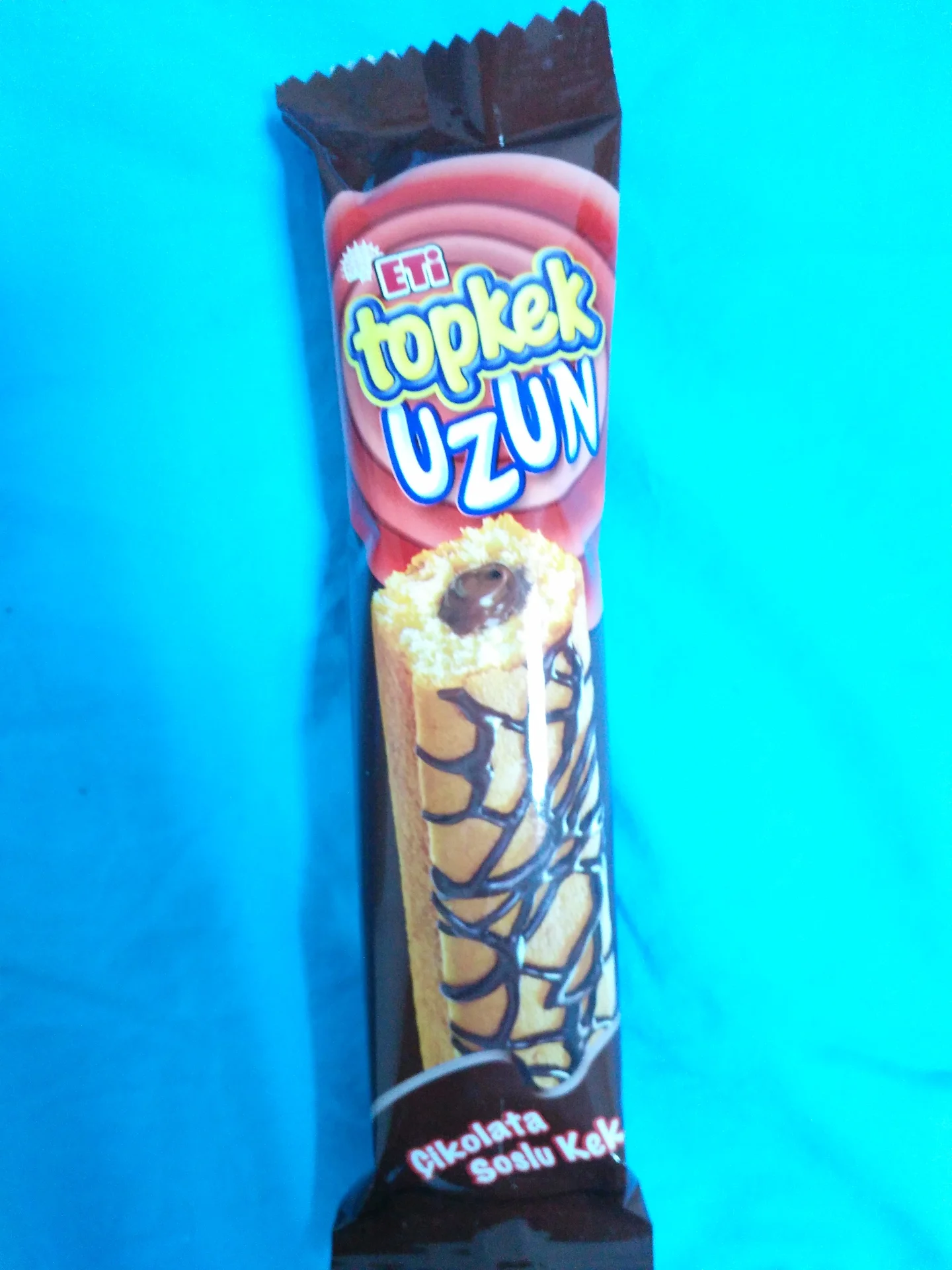 Eti Topkek Uzun long chocolate sauce cake bar in its packaging