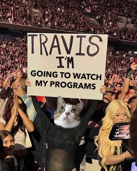 Travis I'm Pregnant Sign — Edited Kourtney Kardashian meme with sign reading 'Travis I want Dr. Feelgood to do my BBL'.