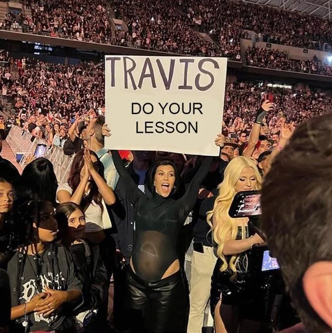 Travis I'm Pregnant Sign — Edited Kourtney Kardashian meme with sign reading 'Travis I'm a Subway Surfer'.