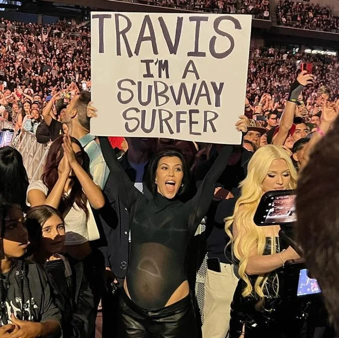 Travis I'm Pregnant Sign — Kourtney Kardashian pregnancy sign meme edit with caption about the Texas power grid.