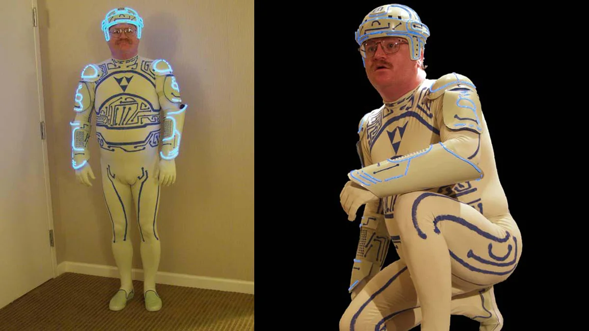 Tron Guy — Jay Maynard in his glowing blue Tron costume shown standing and kneeling